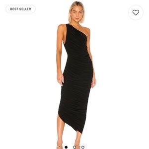 Flattering black one shoulder gown.